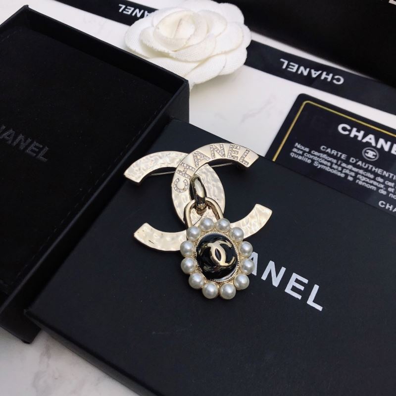 Ch*el brooches